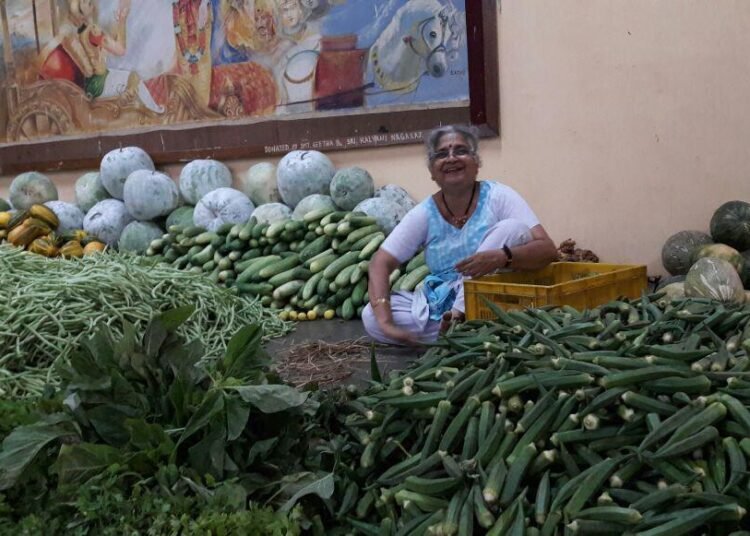 Lady in the picture is Mrs. Sudha Murthy